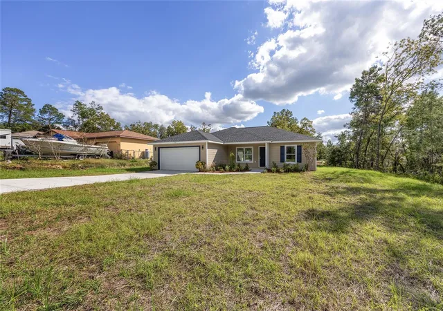 Photo 3 of Single family home for sale at 5192 SW 159th Street, Ocala, FL 34473 | MLS# OM709700 | Listing updated on 2026-09-01