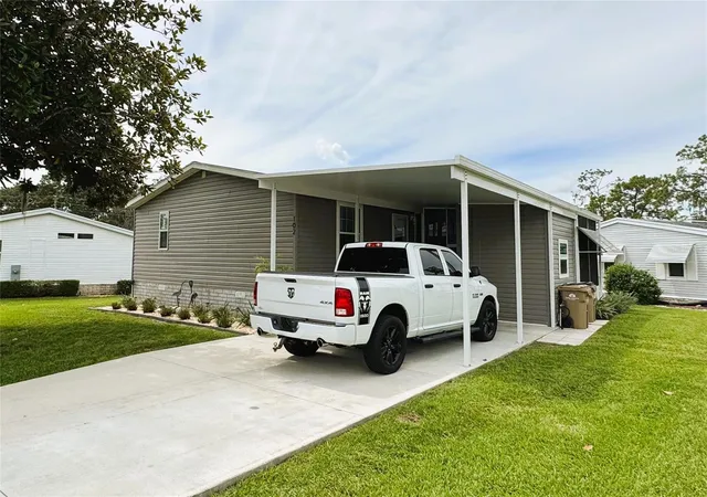 Photo 2 of Manufactured home for sale at 102 Dogwood Trl, Leesburg, FL 34748 | MLS# R4909942 | Listing updated on 2026-09-24