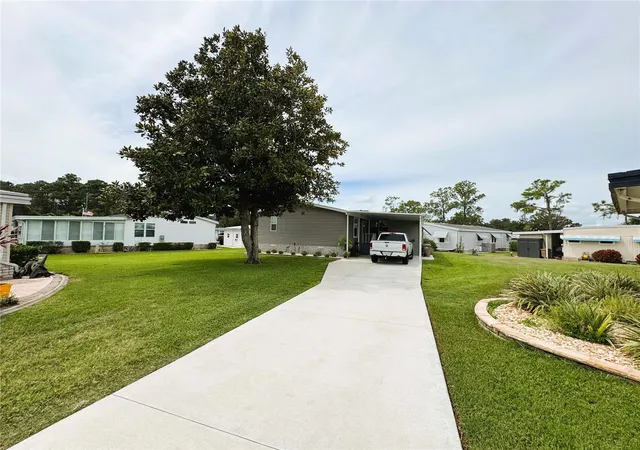 Photo 3 of Manufactured home for sale at 102 Dogwood Trl, Leesburg, FL 34748 | MLS# R4909942 | Listing updated on 2026-09-24
