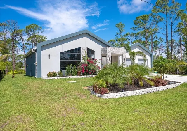 Photo 2 of Single family home for sale at 8167 Dittmar St, Port Charlotte, FL 33981 | MLS# C7514968 | Listing updated on 2026-03-14