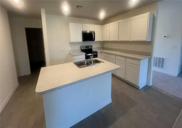 Photo 2 of Single family home for sale at 1436 Pulaski St, Port Charlotte, FL 33952 | MLS# C7515373 | Listing updated on 2026-08-24