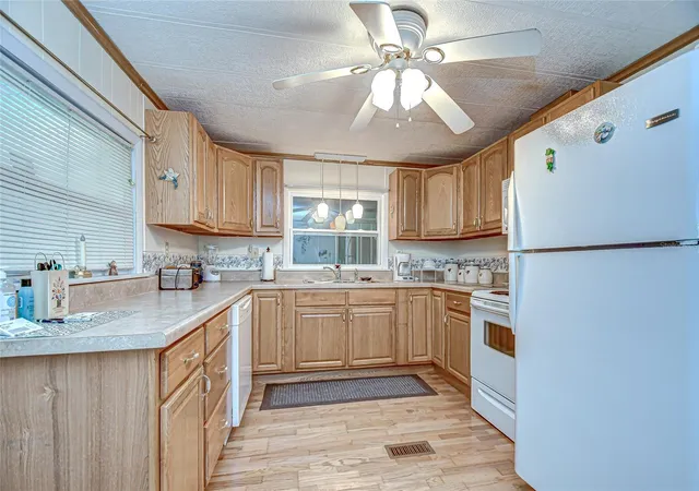 Photo 3 of Manufactured home for sale at 39443 Elgin Dr, Zephyrhills, FL 33542 | MLS# TB8431872 | Listing updated on 2026-09-28