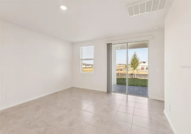 2nd image of 879 Sunshower Dr, Lady Lake, FL 32159 | MLS# O6348077