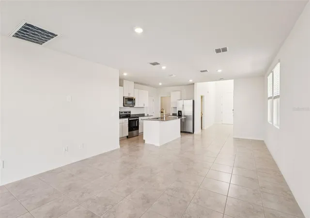 Photo 3 of Sale Pending at 879 Sunshower Dr, Lady Lake, FL 32159 | MLS# O6348077 | Listing updated on 2026-09-22