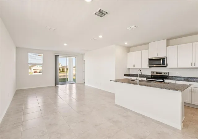 Photo 3 of Sale Pending at 879 Sunshower Dr, Lady Lake, FL 32159 | MLS# O6348077 | Listing updated on 2026-09-22