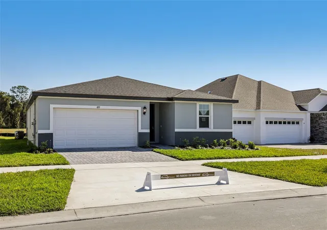 Photo 3 of Single family home for sale at 855 Sunshower Dr, Lady Lake, FL 32159 | MLS# O6348081 | Listing updated on 2026-10-07