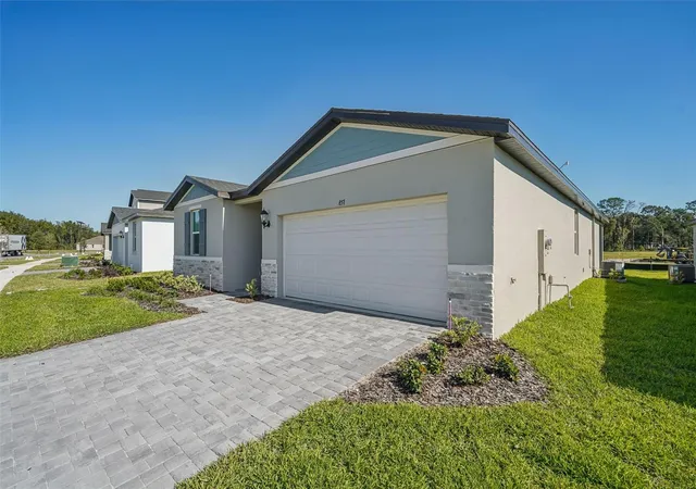 Photo 2 of Single family home for sale at 851 Sunshower Dr, Lady Lake, FL 32159 | MLS# O6348090 | Listing updated on 2026-10-07