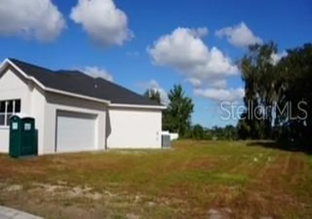 Photo 2 of Single family home for sale at 589 Christina Lake Dr, Lakeland, FL 33813 | MLS# TB8432752 | Listing updated on 2026-10-20