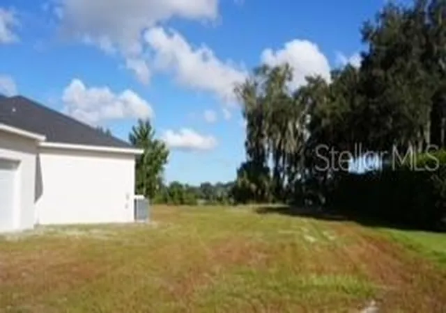 Photo 3 of Single family home for sale at 589 Christina Lake Dr, Lakeland, FL 33813 | MLS# TB8432752 | Listing updated on 2026-10-20