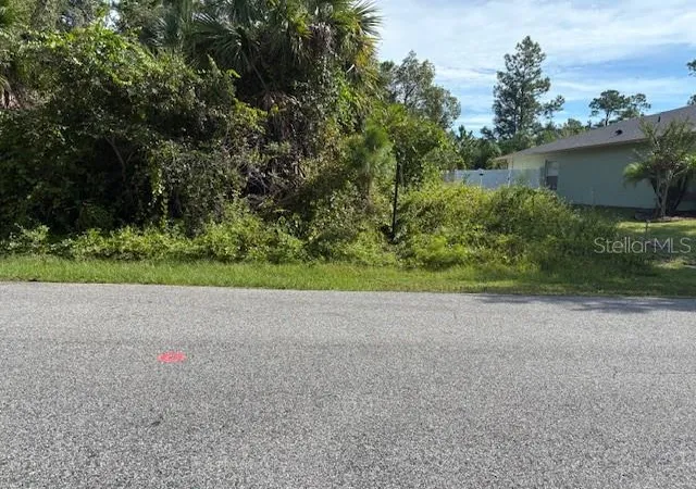 1st image of 98 Sloganeer Trl, Palm Coast, FL 32164 | MLS# O6348594