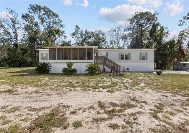 Photo 1 of Manufactured home for sale at 4945 Sw 358 Highway, Steinhatchee, FL 32359 | MLS# W7879435 | Listing updated on 2026-10-08