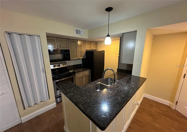 Listing Photo 4 - Condo for sale in building located at 5108 Conroy Rd, Orlando, FL 32811 - Unit #1713