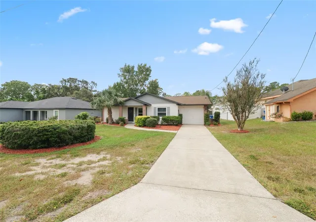 Photo 3 of Single family home for sale at 12056 Cradock St, Spring Hill, FL 34608 | MLS# W7879627 | Listing updated on 2026-10-06