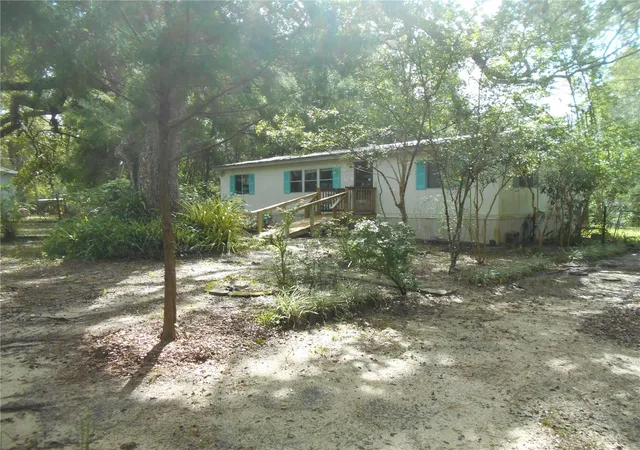 Photo 2 of Manufactured home for sale at 20425 Ne 143rd Street, Fort Mc Coy, FL 32134 | MLS# OM710940 | Listing updated on 2026-09-03