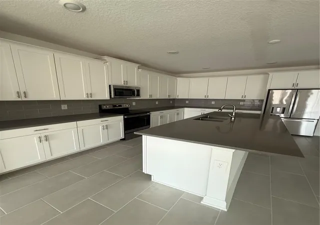 4th image of 1123 Kingsbarn St, Davenport, FL 33896 | MLS# O6350323