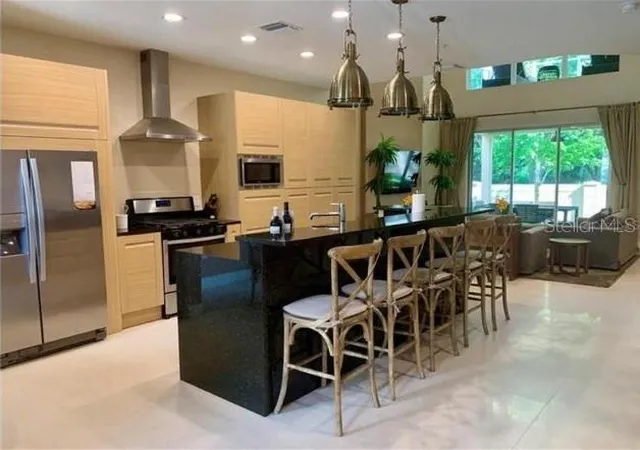 Photo 3 of Townhouse for sale at 7657 Recife Dr, Kissimmee, FL 34747 | MLS# O6350643 | Listing updated on 2026-10-14