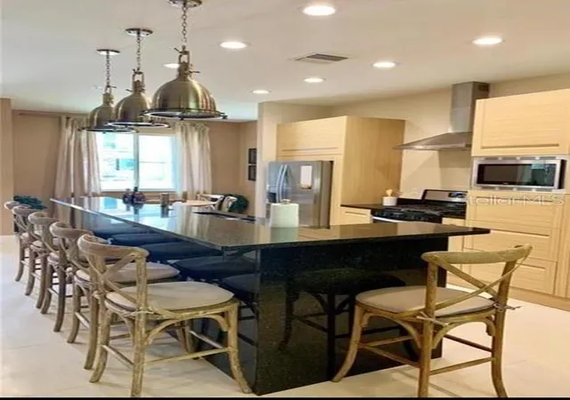 Photo 4 of Townhouse for sale at 7657 Recife Dr, Kissimmee, FL 34747 | MLS# O6350643 | Listing updated on 2026-10-14
