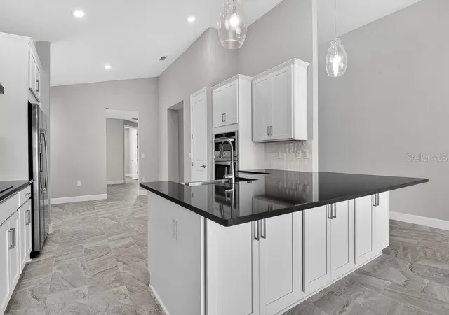 4th image of 39 Oconee Dr, Palm Coast, FL 32137 | MLS# O6351002