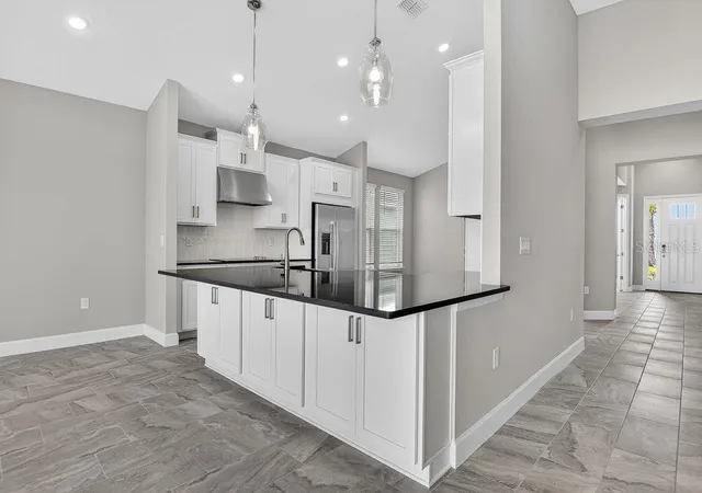 5th image of 39 Oconee Dr, Palm Coast, FL 32137 | MLS# O6351002