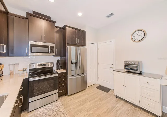 Photo 2 of Townhouse for sale at 2441 Foggy Creek Cir, Clearwater, FL 33764 | MLS# TB8436335 | Listing updated on 2026-10-15