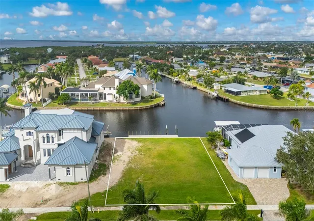 Photo 4 of Land for sale at 234 Beeney Rd SE, Port Charlotte, FL 33952 | MLS# C7516081 | Listing updated on 2026-04-15