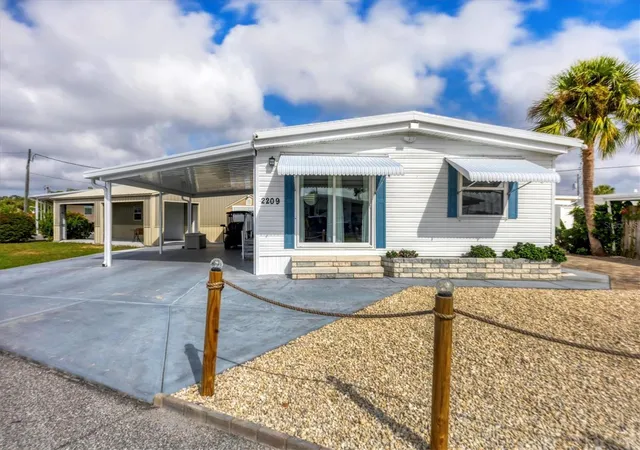 Photo 2 of Manufactured home for sale at 2209 Iowa Ave, Bradenton, FL 34207 | MLS# A4668040 | Listing updated on 2026-08-02