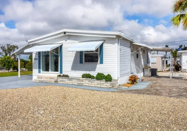 Photo 3 of Manufactured home for sale at 2209 Iowa Ave, Bradenton, FL 34207 | MLS# A4668040 | Listing updated on 2026-08-02