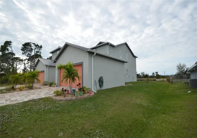 Photo 2 of Multi family home for sale at 8581 Agate St, Port Charlotte, FL 33981 | MLS# O6352079 | Listing updated on 2026-06-16