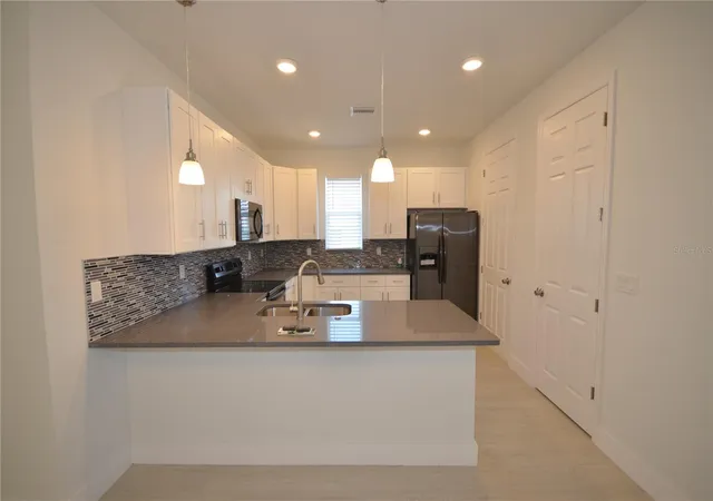 Listing Photo 5 - Condo for sale in building located at 8581 Agate St, Port Charlotte, FL 33981