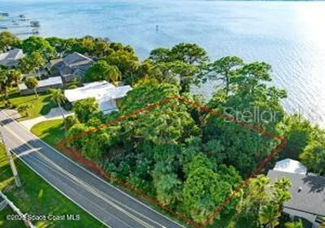 1st image of 0 S Tropical Trl, Merritt Island, FL 32952 | MLS# O6352696