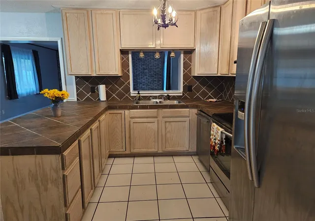 Photo 2 of Single family home for sale at 1212 Blake Ave, Auburndale, FL 33823 | MLS# P4936709 | Listing updated on 2026-10-08