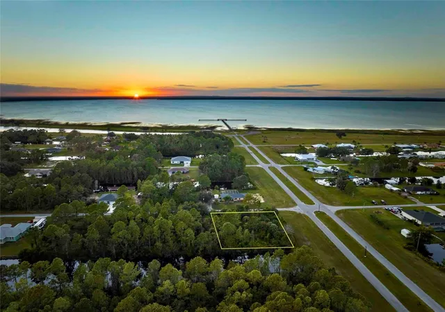 1st image of 2 Amaryllis Dr, Indian Lake Estates, FL 33855 | MLS# TB8438714