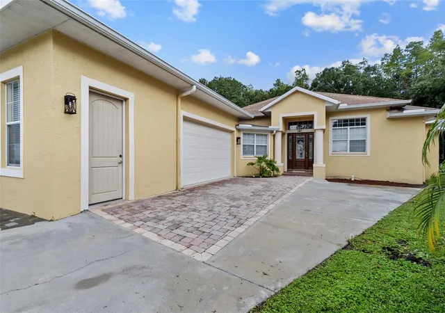 Photo 2 of Single family home for sale at 4116 Woodacre Ln, Tampa, FL 33624 | MLS# TB8438813 | Listing updated on 2026-09-12