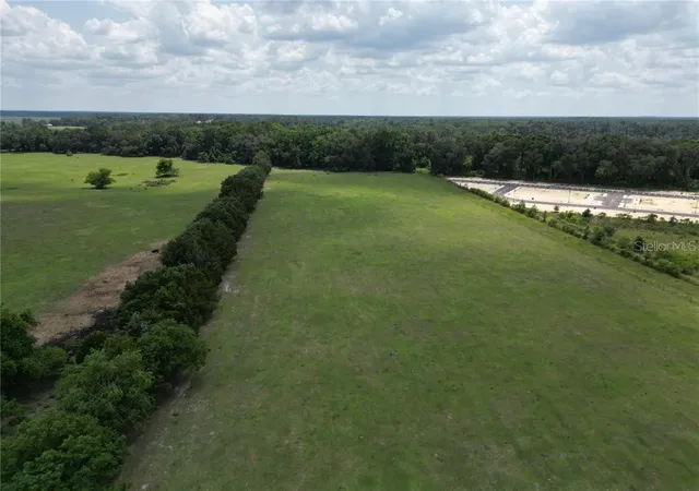 3rd image of 2411 Acres Sw 62nd Ave, Gainesville, FL 32607 | MLS# O6353637