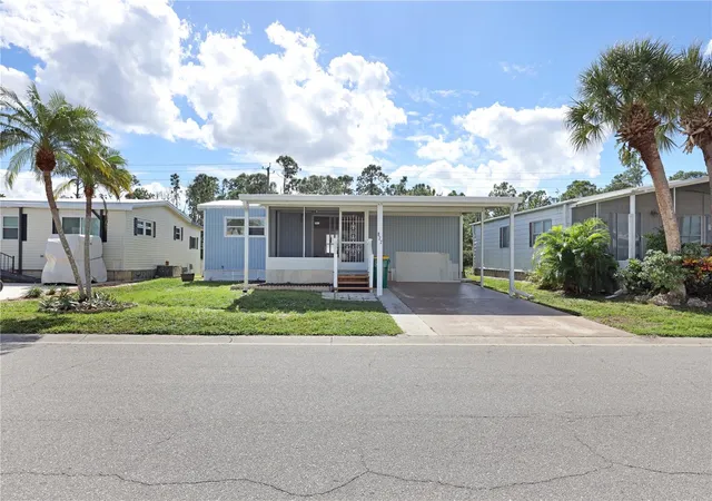 Photo 1 of Manufactured home for sale at 2100 Kings Hwy #877, Port Charlotte, FL 33980 | MLS# C7516542 | Listing updated on 2026-09-30