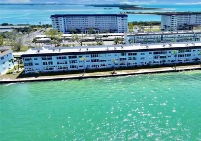 Photo 1 of Condo for sale at 7 Dunoon Pl #203, Dunedin, FL 34698 | MLS# W7880069 | Listing updated on 2026-10-07