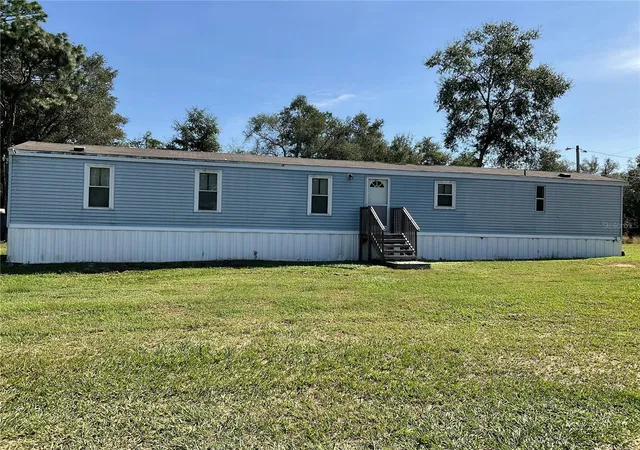 Photo 1 of Manufactured home for sale at 18057 Se 20th Place, Silver Springs, FL 34488 | MLS# OM712059 | Listing updated on 2026-09-14