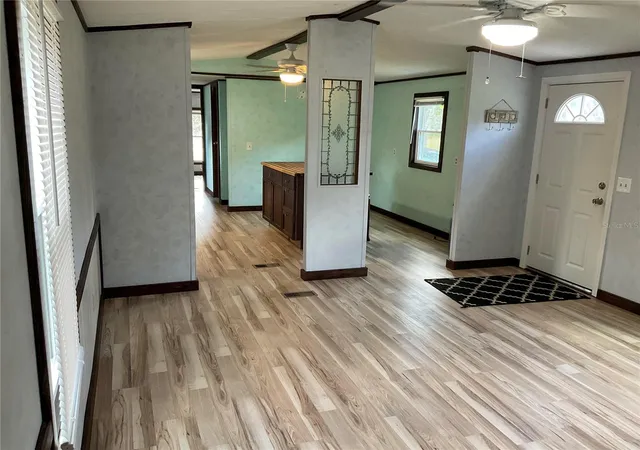 Photo 3 of Manufactured home for sale at 18057 Se 20th Place, Silver Springs, FL 34488 | MLS# OM712059 | Listing updated on 2026-09-14