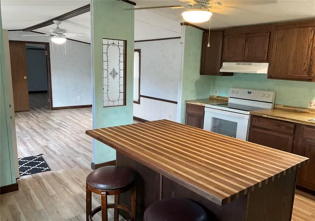 Photo 4 of Manufactured home for sale at 18057 SE 20th Place, Silver Springs, FL 34488 | MLS# OM712059 | Listing updated on 2026-09-14