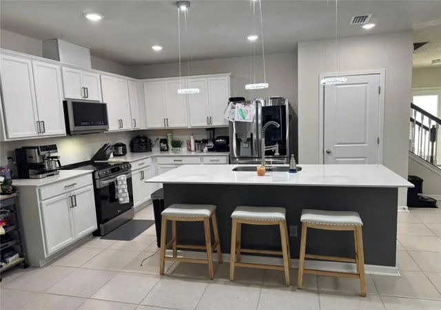 Photo 3 of Single family home for sale at 1877 Summer Serenity Dr, Kissimmee, FL 34744 | MLS# O6354995 | Listing updated on 2026-02-26