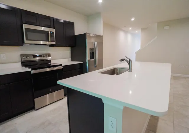 4th image of 12016 Grizzly Ln, New Port Richey, FL 34654 | MLS# TB8441309