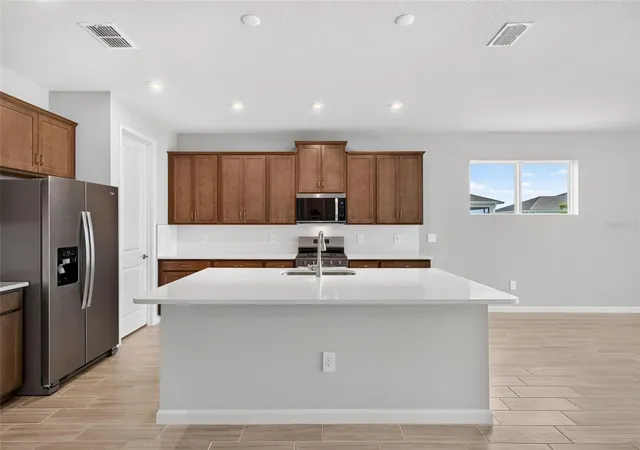 Photo 4 of Single family home for sale at 9240 Derbyshire Dr, Parrish, FL 34219 | MLS# TB8442360 | Listing updated on 2026-10-08