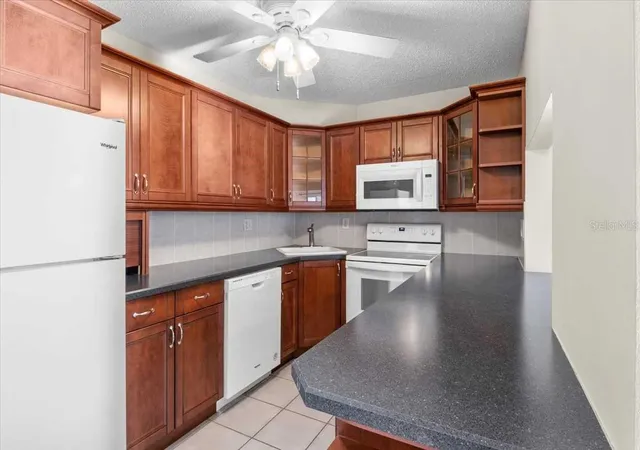 Photo 4 of Condo for sale at 1127 Pine Ridge Cir W #A2, Tarpon Springs, FL 34688 | MLS# TB8442544 | Listing updated on 2026-08-09