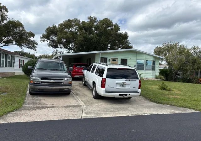 Photo 2 of Manufactured home for sale at 6033 Grand Oaks Dr Se, Winter Haven, FL 33884 | MLS# P4936903 | Listing updated on 2026-06-24