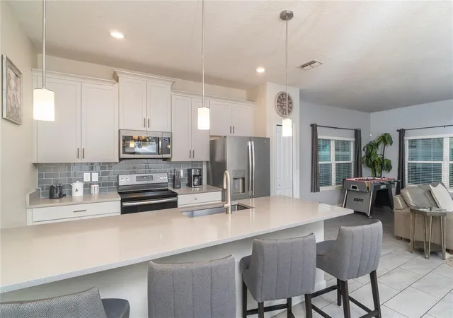 Photo 3 of Townhouse for sale at 230 Ocean Crse Ave, Davenport, FL 33896 | MLS# O6357494 | Listing updated on 2025-11-07