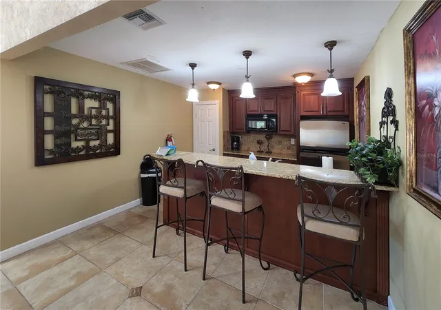 Listing Photo 2 - Condo for sale in building located at 9100Th Dr Martin Luther King Jr St N, St. Petersburg, FL 33702 - Unit #905