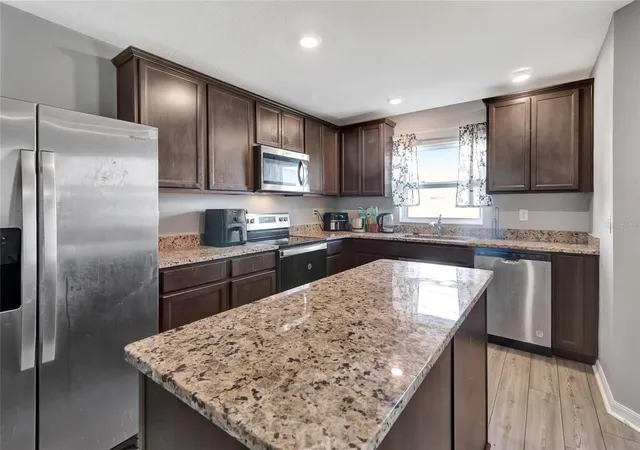Photo 2 of Townhouse for sale at 1691 Wynford Cir, Tavares, FL 32778 | MLS# G5104161 | Listing updated on 2026-07-18