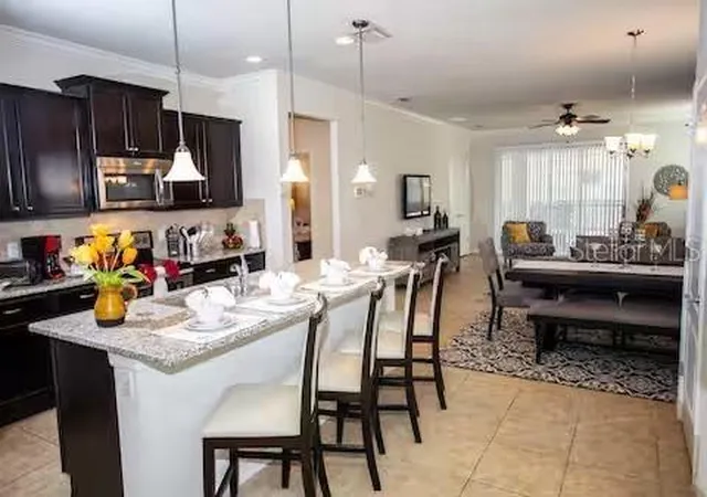 Photo 2 of Single family home for sale at 8956 Rhodes St, Kissimmee, FL 34747 | MLS# O6358195 | Listing updated on 2026-08-19