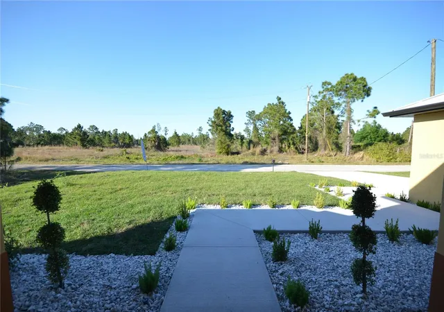 Photo 3 of Single family home for sale at 1242 Hathor St E, Lehigh Acres, FL 33974 | MLS# O6358580 | Listing updated on 2026-09-02