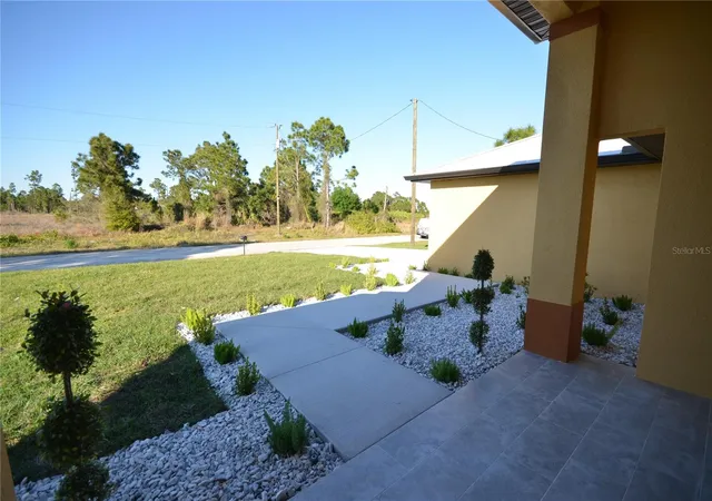 Photo 3 of Single family home for sale at 1242 Hathor St E, Lehigh Acres, FL 33974 | MLS# O6358580 | Listing updated on 2026-09-02